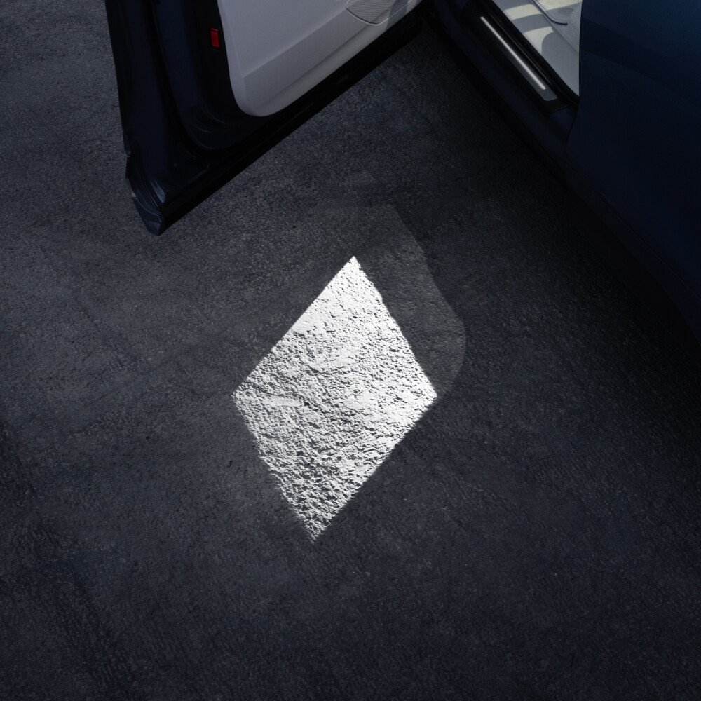 White diamond projected under the open door